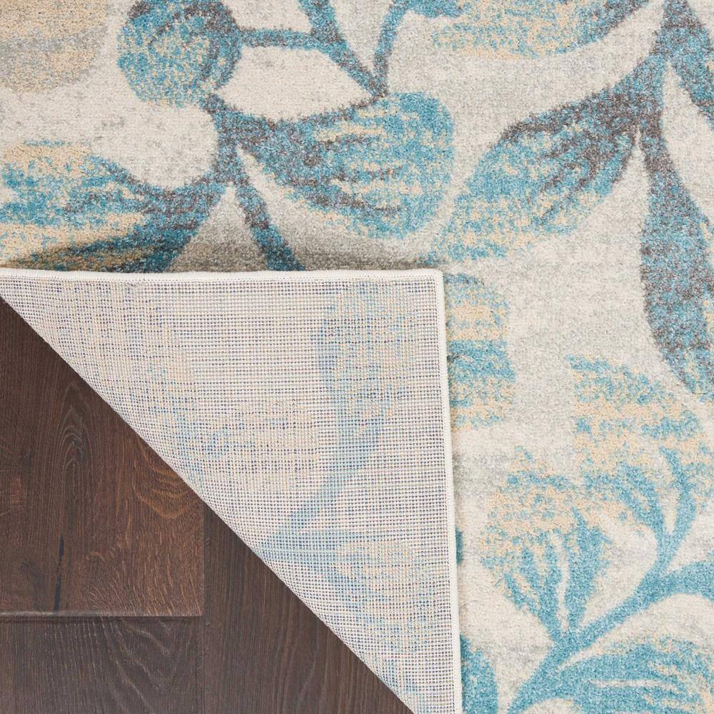 Ivory and Turquoise Floral Synthetic 4' x 6' Area Rug