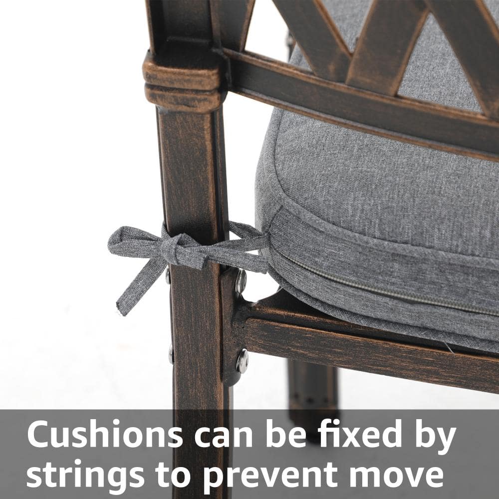 Close-up of a chair frame and cushion tie-down detail.