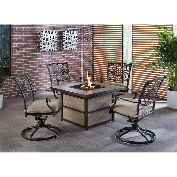 Hanover Traditions 5-Piece Aluminum Fire Pit Patio Seating Set with Tan Cushions, Swivel Rockers and Fire Pit Table