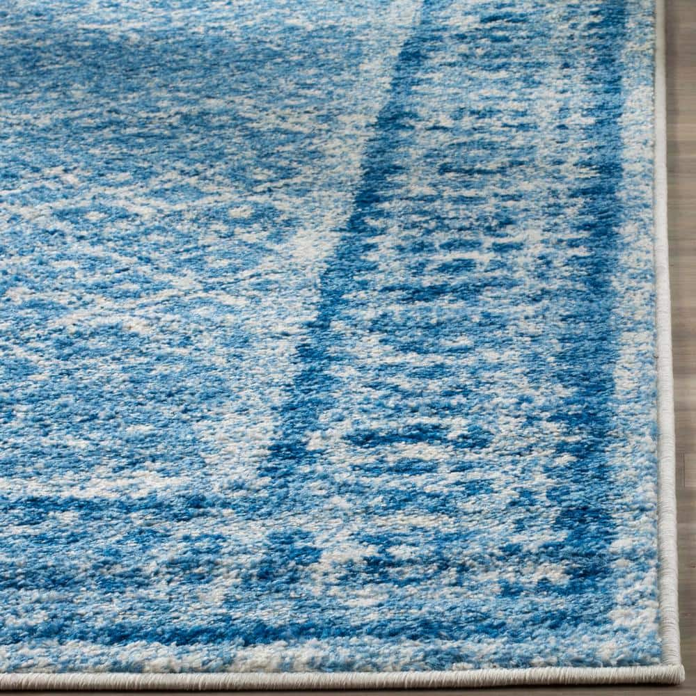 Blue and Silver Synthetic 10' x 14' Rectangular Area Rug