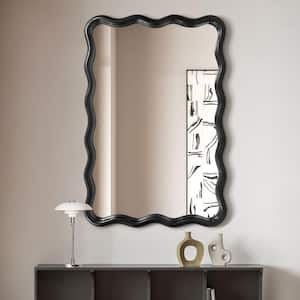 24 in. W x 36 in. H Rectangle Black Wood Framed Wavy Wall Mirror