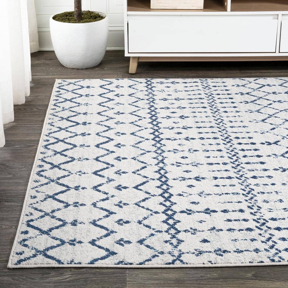 Ivory and Navy 4' x 6' Synthetic Trellis Area Rug