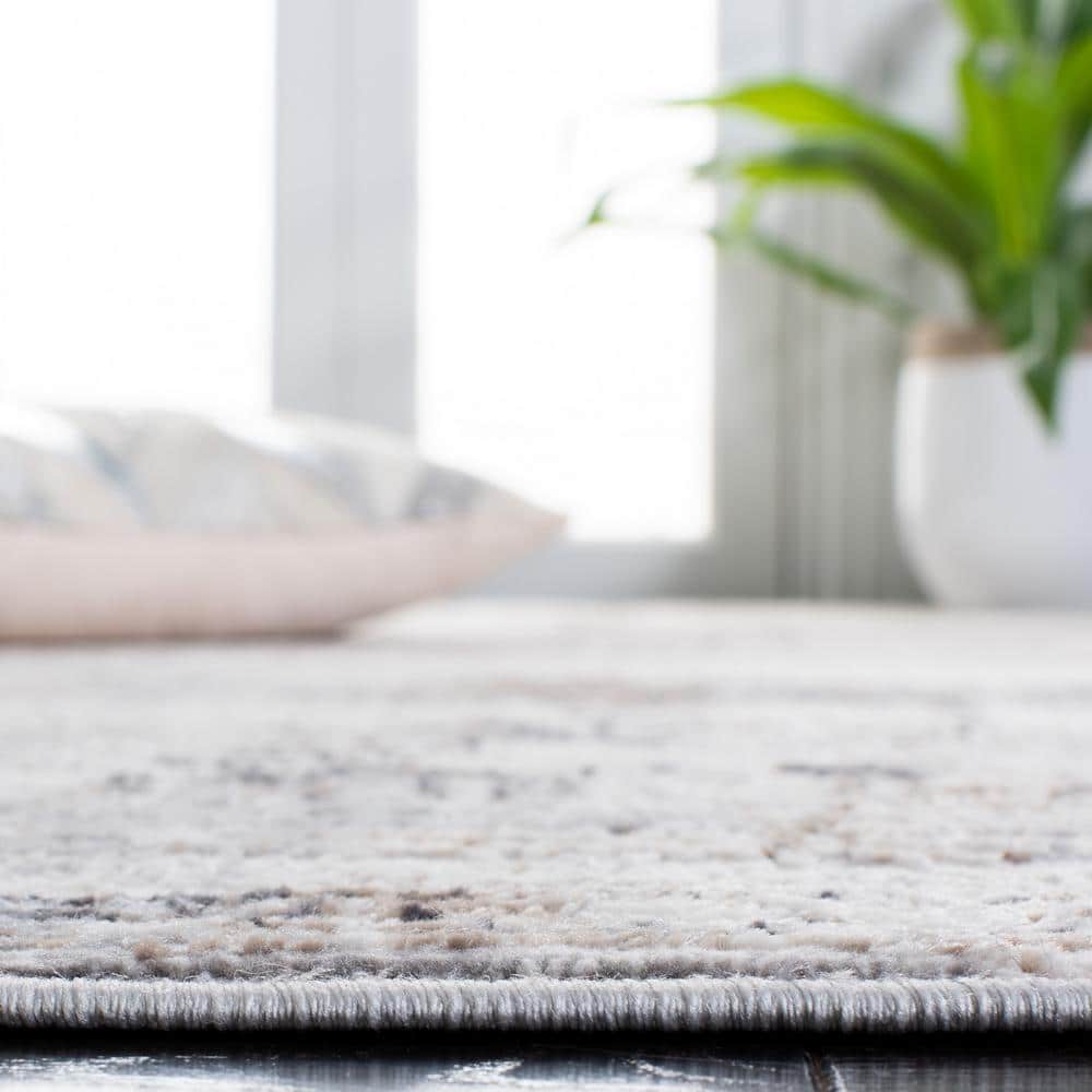 Ivory and Gray Abstract 8' x 10' Stain-Resistant Rug