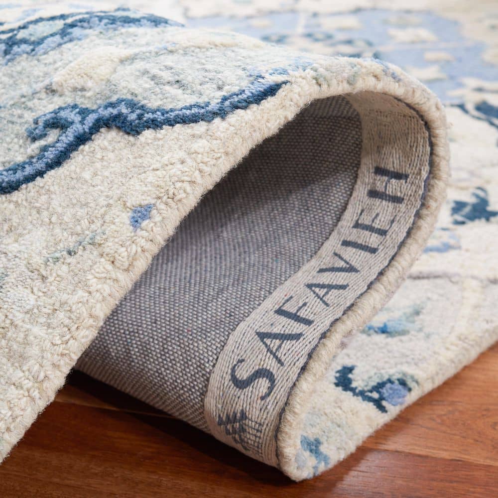 Beige and Blue 9' x 12' Hand-Tufted Wool Area Rug