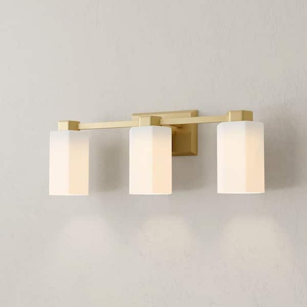 Progress Lighting Estrada 22.37 in. 3-Light Brushed Gold Vanity Light with Opal Glass Shade