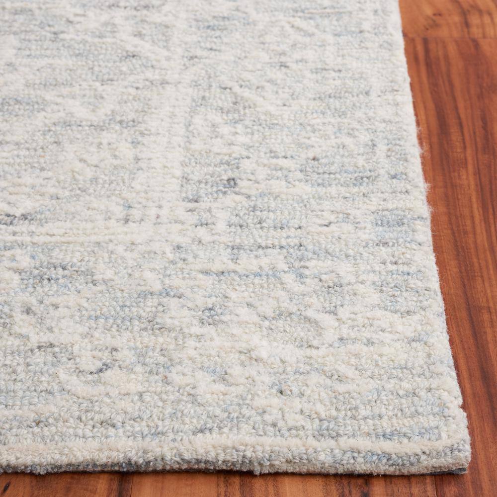 Ivory Hand Tufted Wool 4' x 6' Area Rug