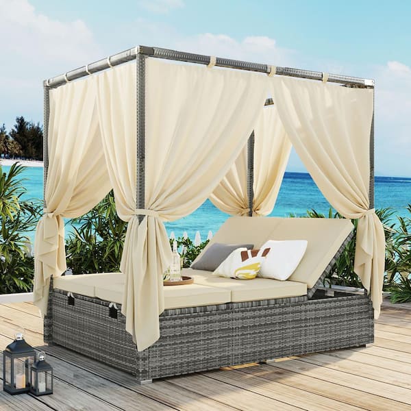 Boosicavelly Gray Wicker Outdoor Day Bed with Beige Cushions and Beige Curtains and Adjustable Backrest