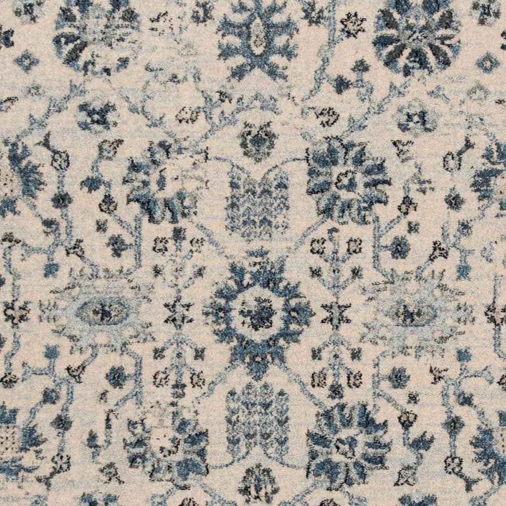 Ivory and Blue 4' x 6' Synthetic Rectangular Area Rug