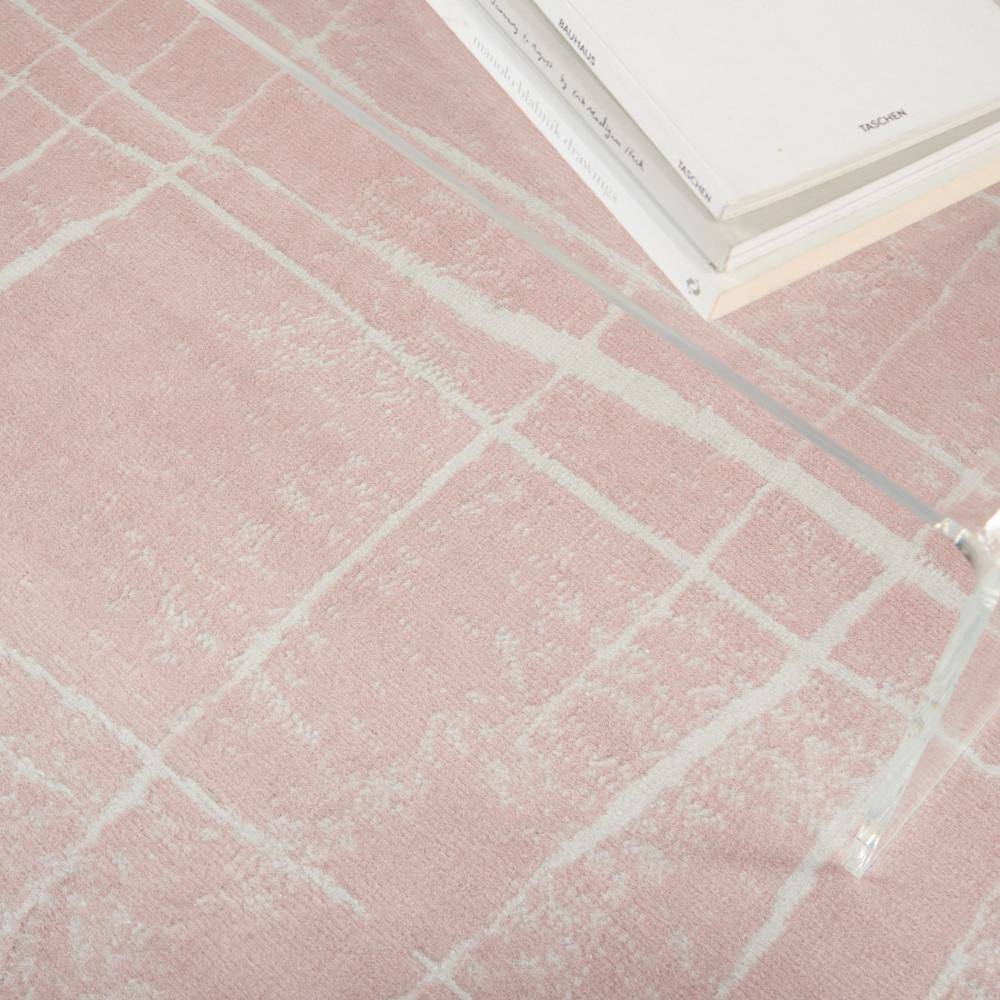 Ivory and Pink Abstract Synthetic 6' x 9' Area Rug