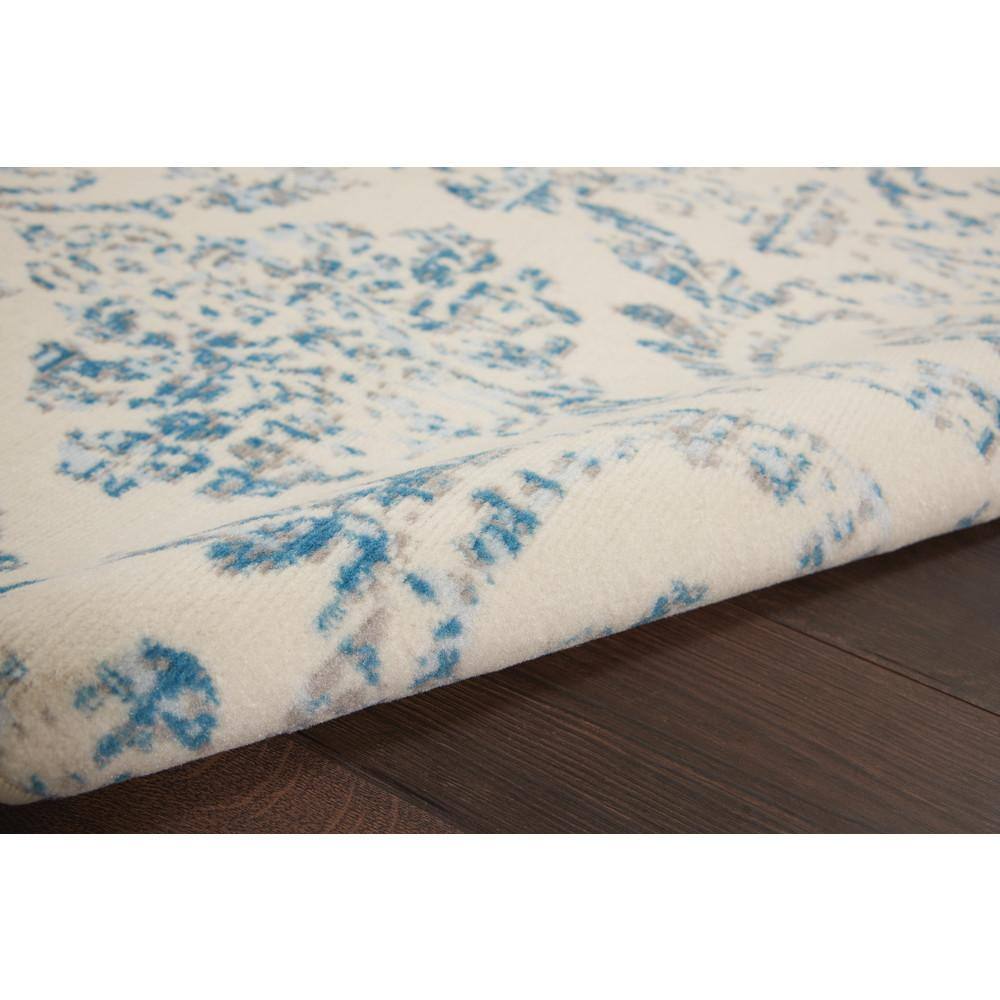 Elegant Ivory and Blue Damask 5' x 7' Synthetic Area Rug