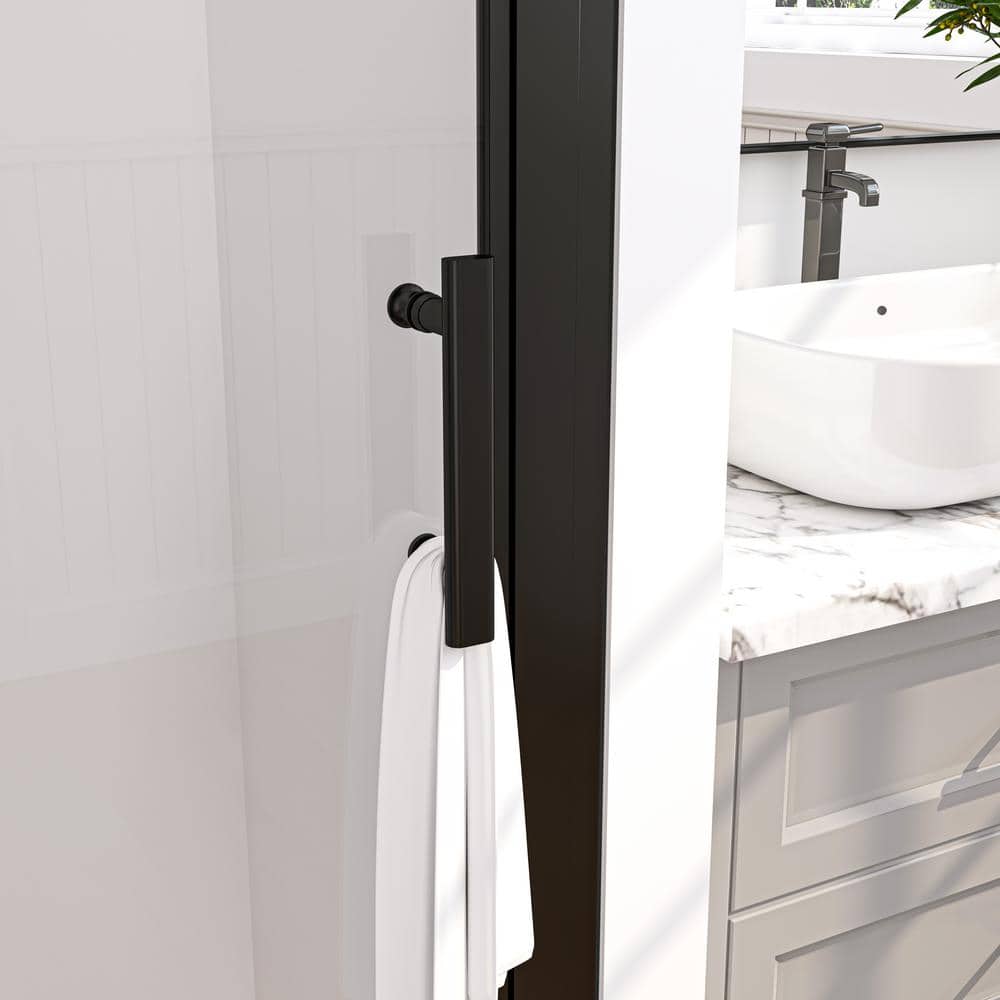 34'' W x 72'' H Frameless Clear Glass Pivot Shower Door in Matte Black Finish