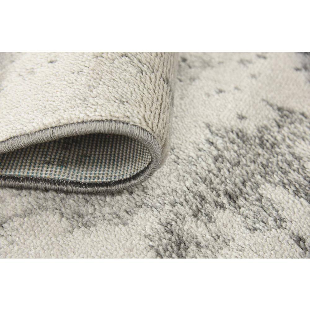 Light Gray Abstract Synthetic 4' x 6' Easy-Care Area Rug
