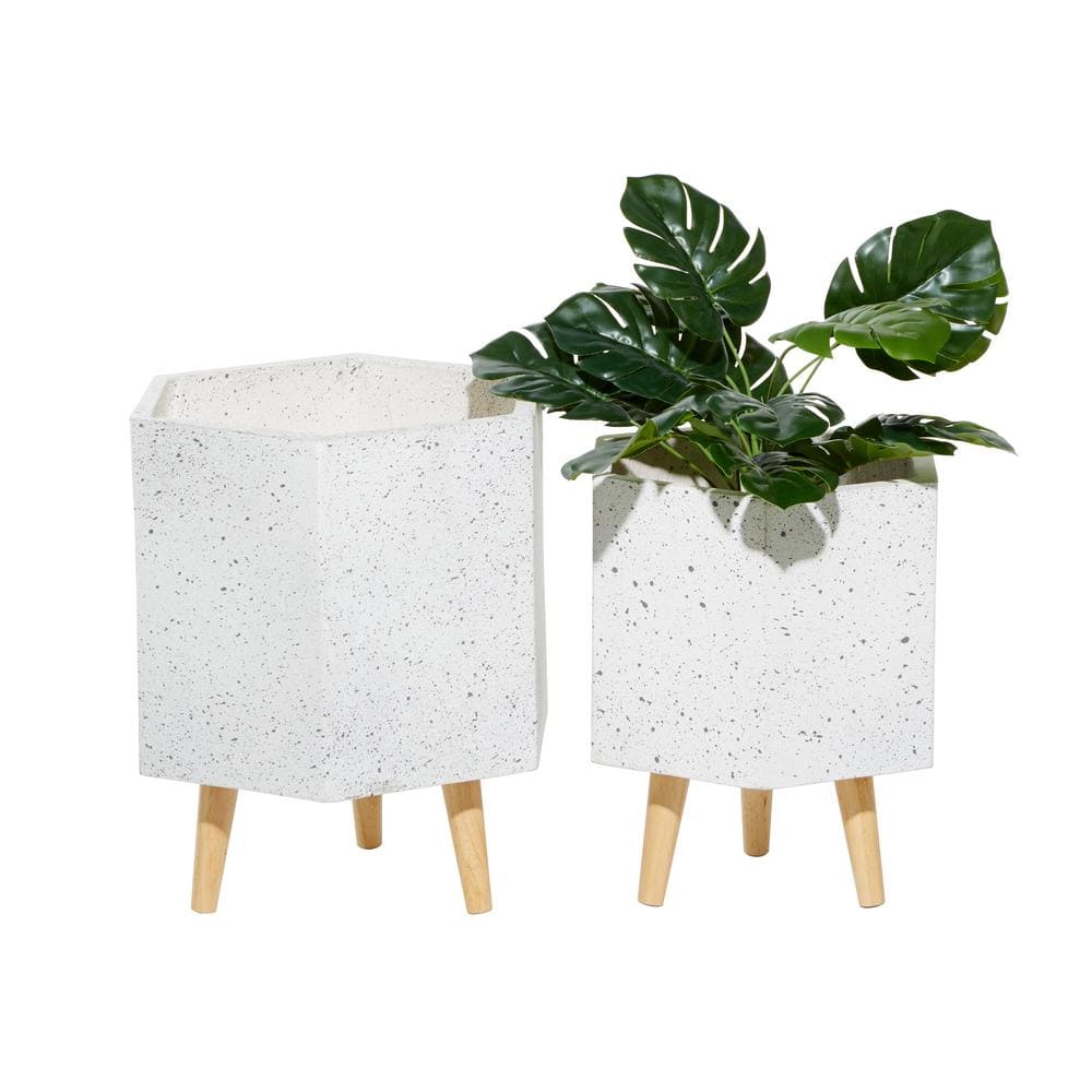https://images.thdstatic.com/productImages/c4b12f53-704f-5913-8076-1569509979ba/svn/white-litton-lane-plant-pots-46542-64_1000.jpg