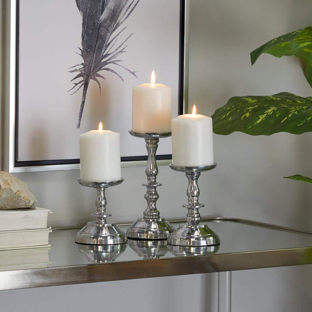 Litton Lane Silver Aluminum Pillar Candle Holder (Set of 3)