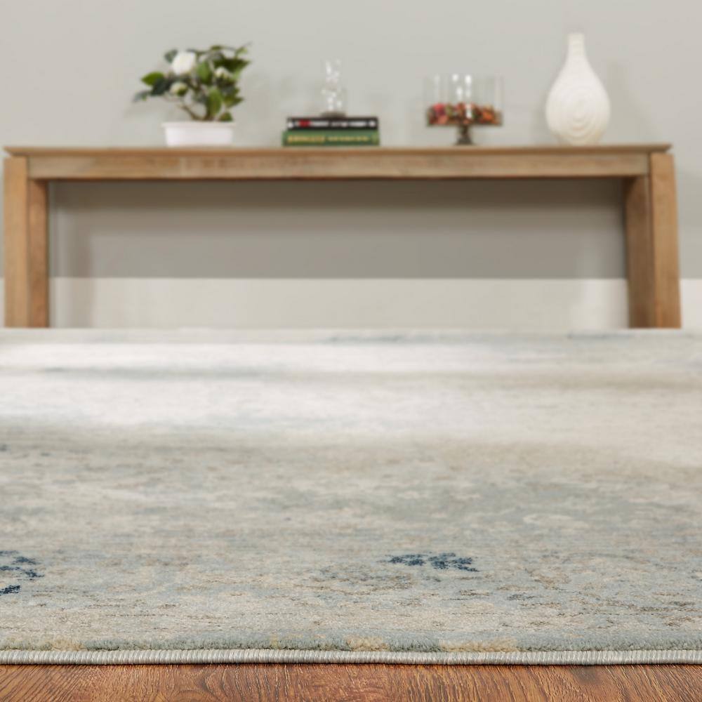 Handmade Blue and Ivory Abstract Synthetic Area Rug, 2' x 3'