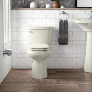 Cimarron Comfort Height 2-Piece 1.28 GPF Single Flush Round Toilet with AquaPiston Flush Technology in Biscuit