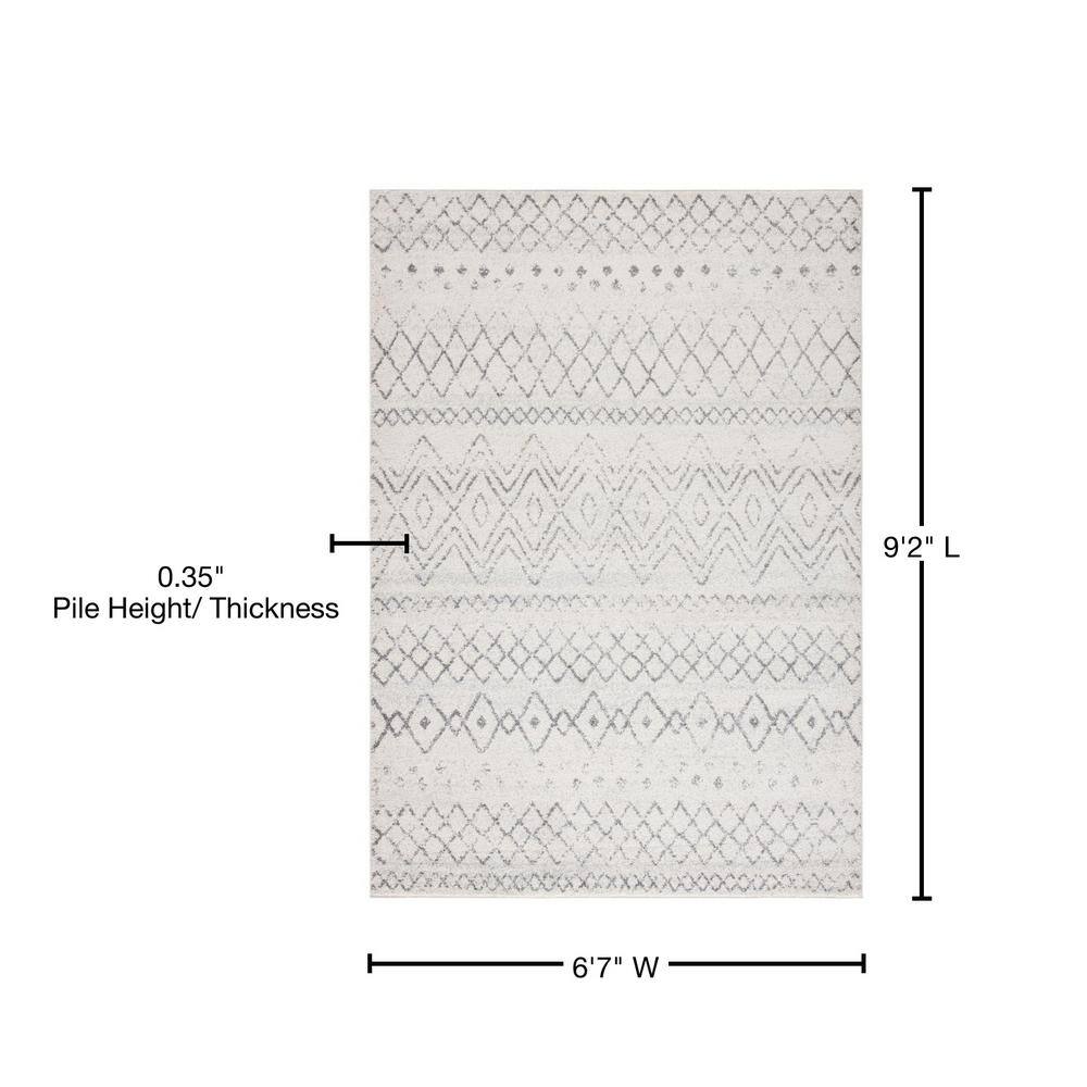 Ivory and Charcoal Geometric Synthetic Area Rug