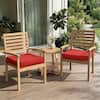 Red seat cushion covers on wooden outdoor furniture outside.