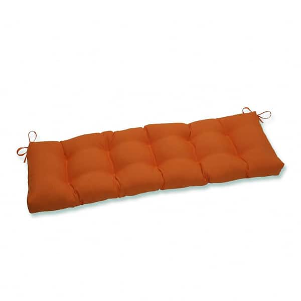 Pillow Perfect Solid Rectangular Outdoor Bench Cushion in Orange