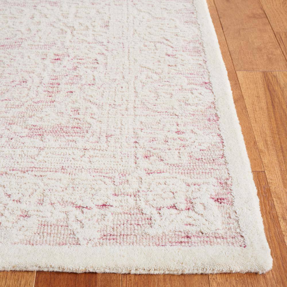 Handmade Pink and Ivory Wool Tufted 6' x 9' Area Rug