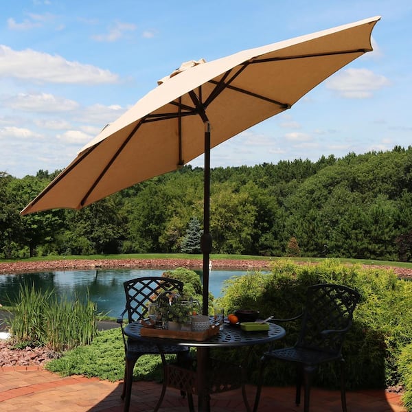 9 ft. Aluminum Market Auto Tilt Patio Umbrella in Sunbrella Beige