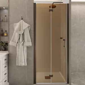 32 to 33-3/8 in. W x 72 in. H Bi-Fold Frameless Shower Door in Bronze with 1/4 in. Tempered Tinted Glass
