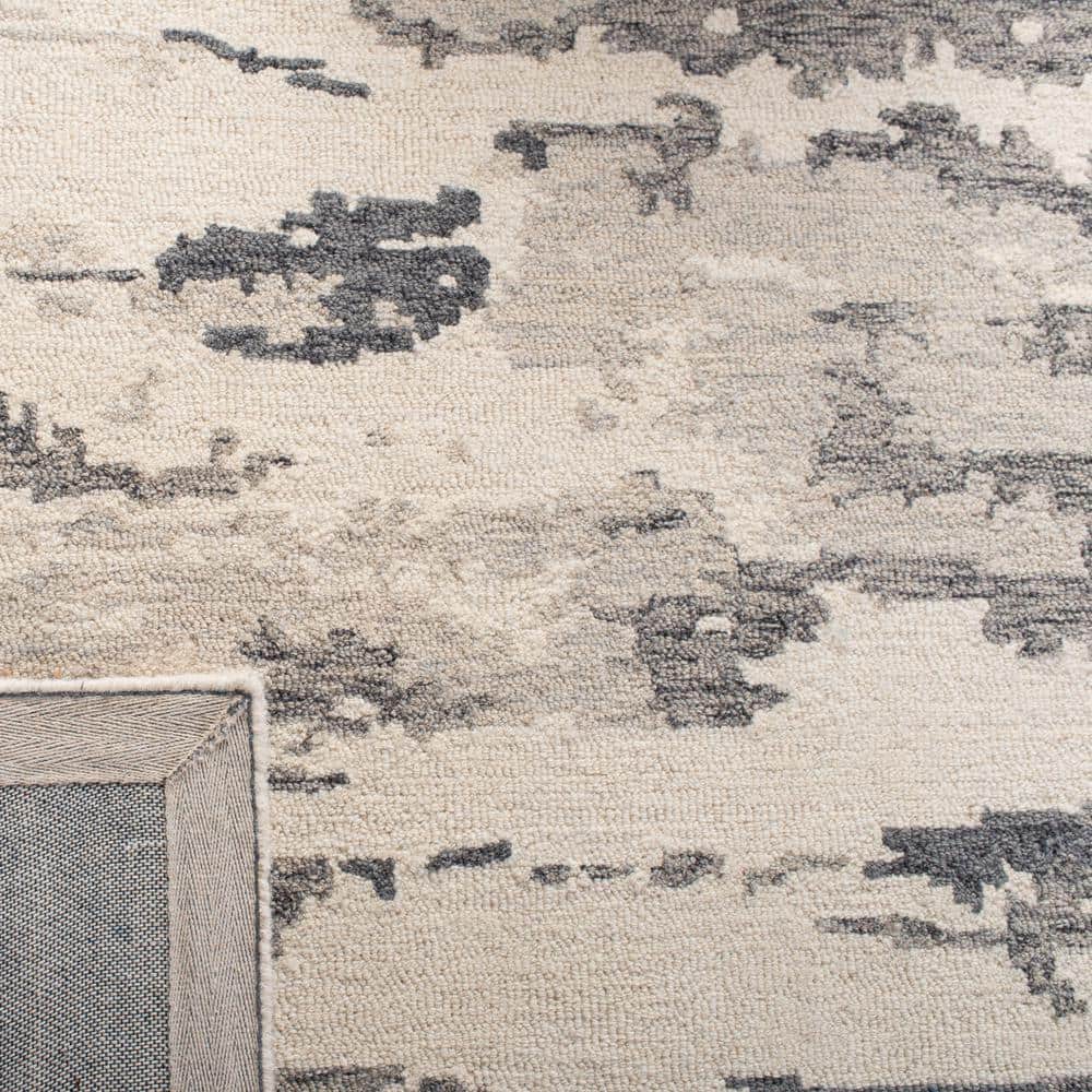 Handmade Charcoal and Ivory Wool 9' x 12' Abstract Tufted Rug
