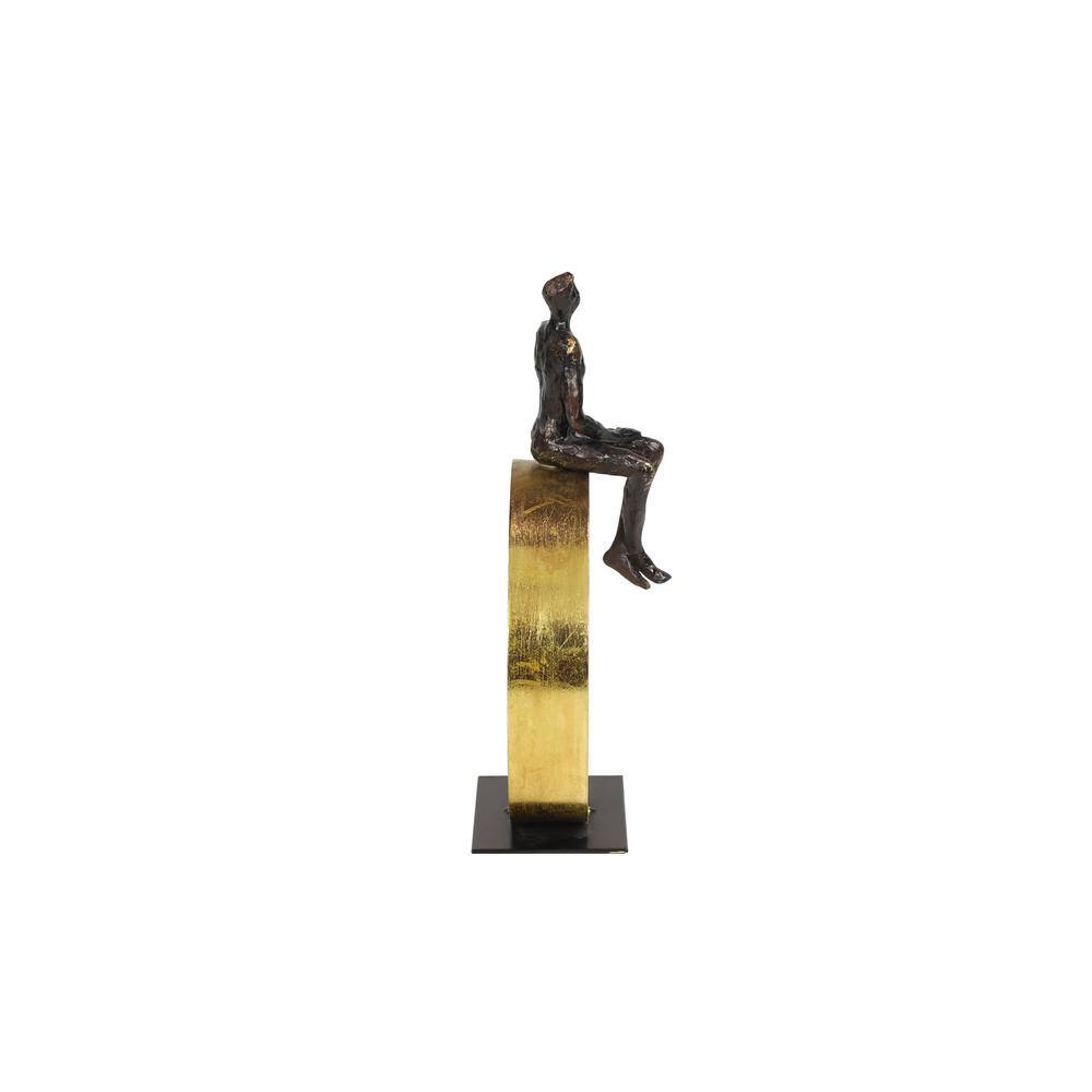 Black and Gold Resin Human Figurine on Circular Base