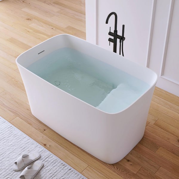 47 in. x 27.5 in. Stone Resin Solid Surface Flatbottom Freestanding Japanese Soaking Bathtub in White with Seat