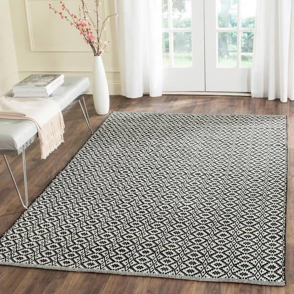 Montauk Ivory/Black Doormat 3 ft. x 4 ft. Solid Area Rug