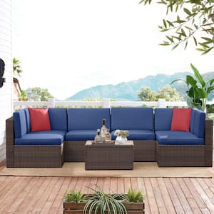 7-Piece Brown Wicker Outdoor Sectional Set with Blue Cushions and Coffee Table