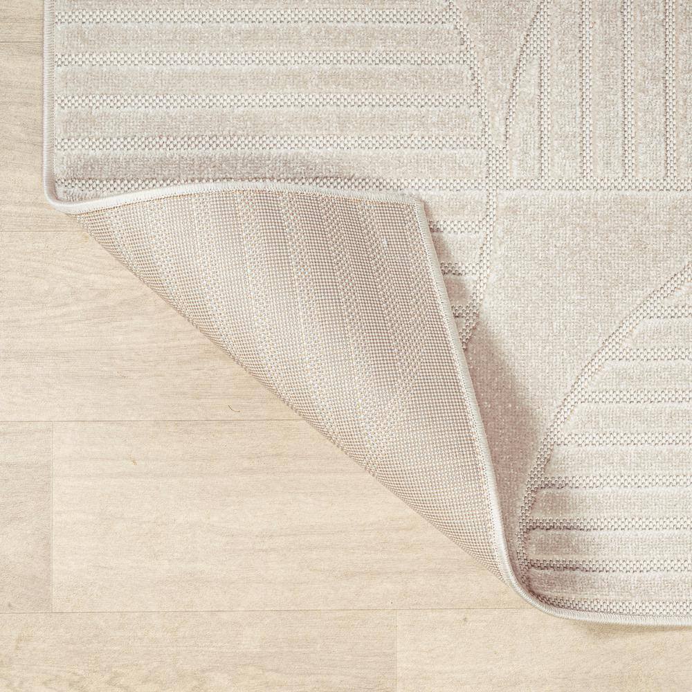 Ivory and Cream Geometric High-Low 8' x 10' Area Rug