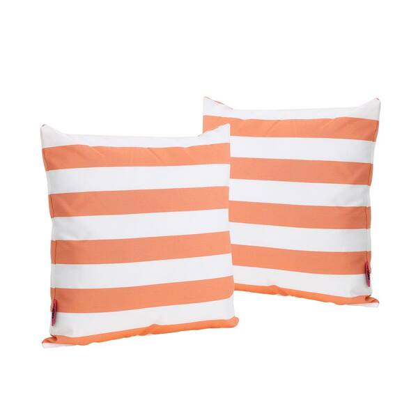 orange and white throw pillows