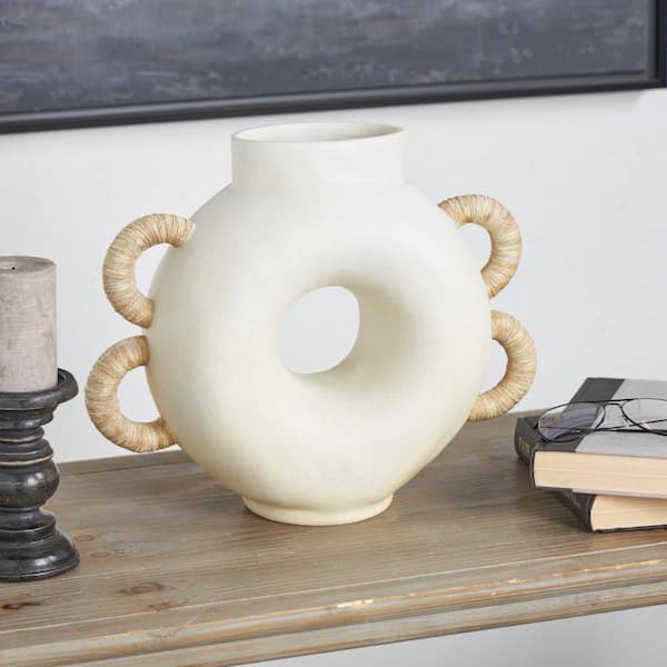 Litton Lane Cream Round Speckled Resin Decorative Vase with Woven Inspired Arched Handles and Cutout Opening