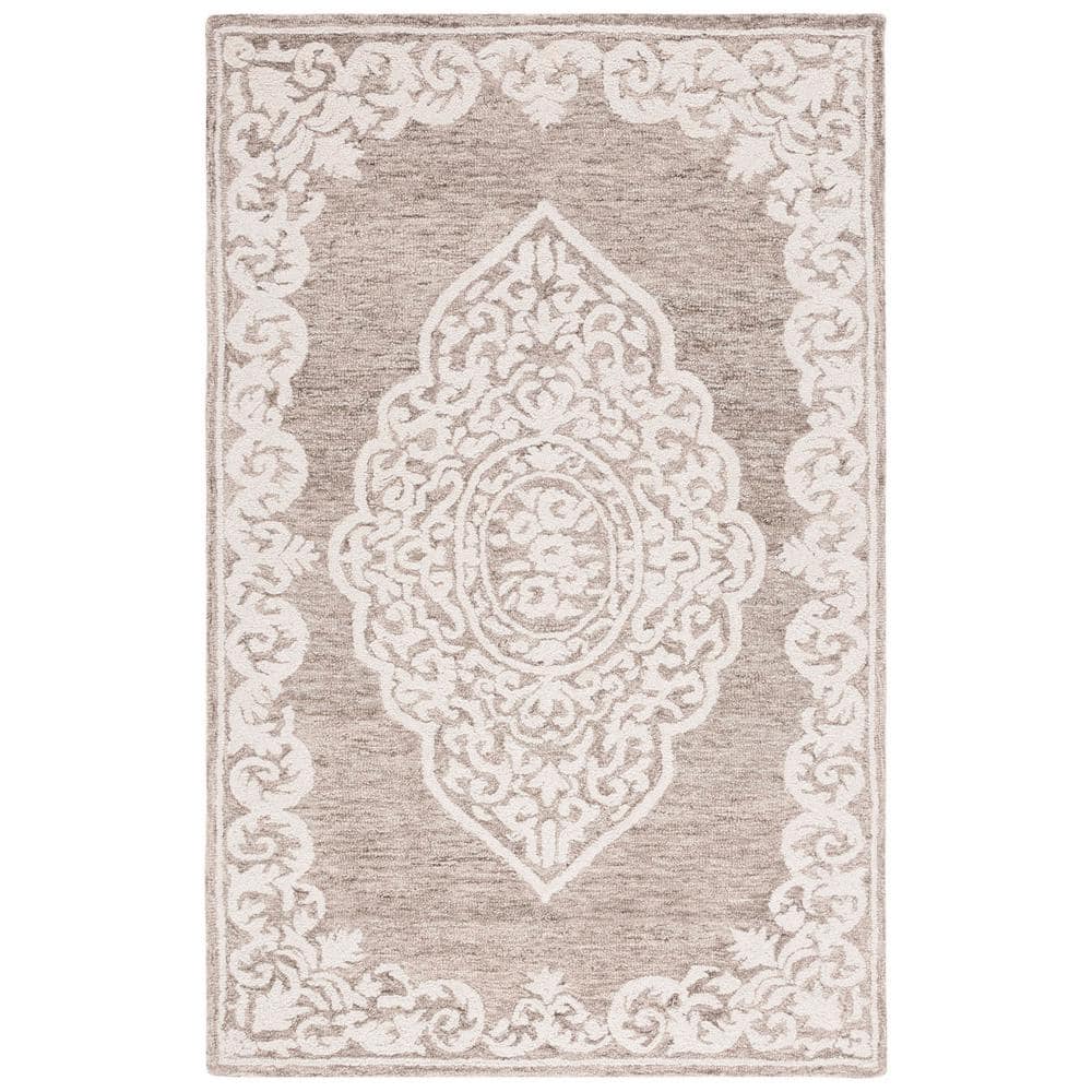 Handmade Ivory Abstract Tufted Wool Round Rug