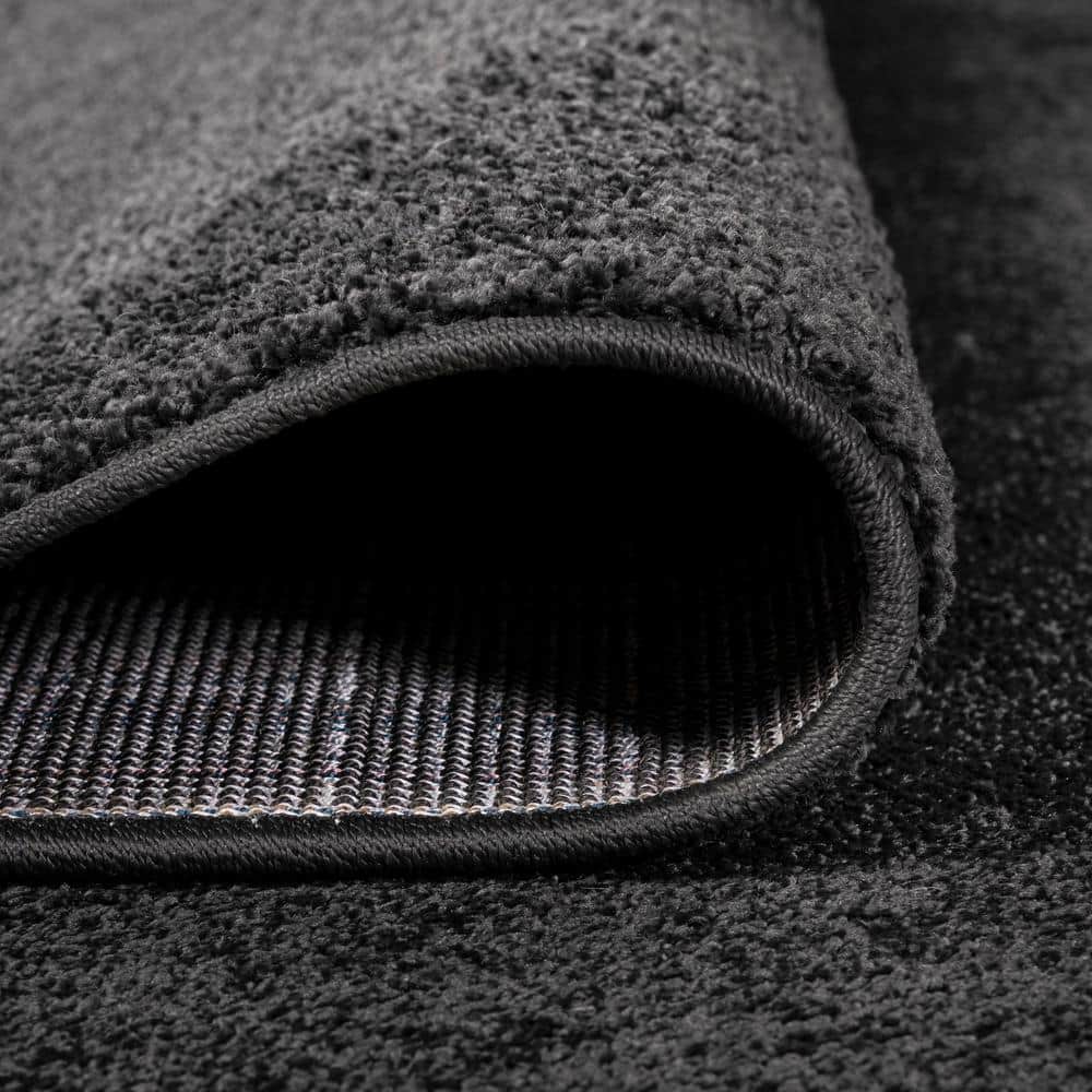 Haze Solid Black Synthetic Low-Pile Area Rug