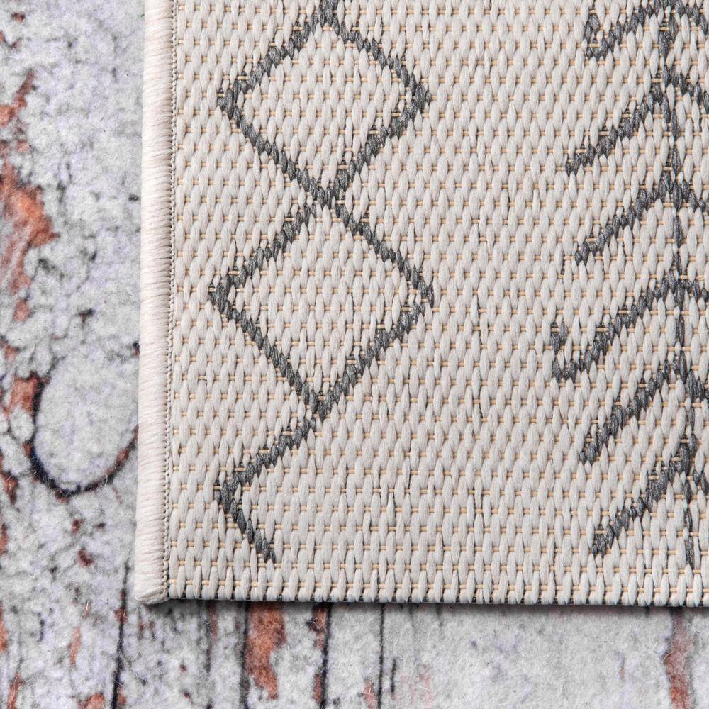 Ivory Geometric Easy-Care Outdoor 7.5' x 10.75' Area Rug