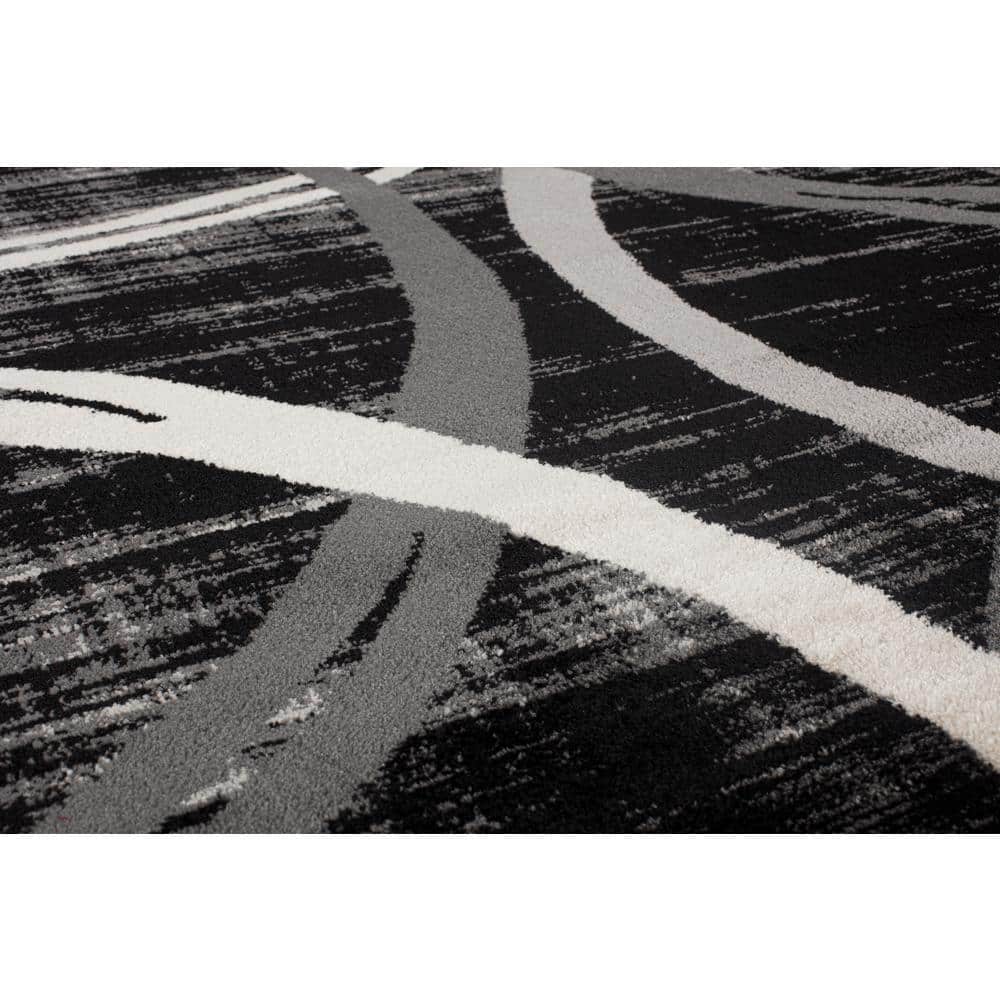 Modern Black and Gray Abstract Oval Area Rug, 5' x 7'
