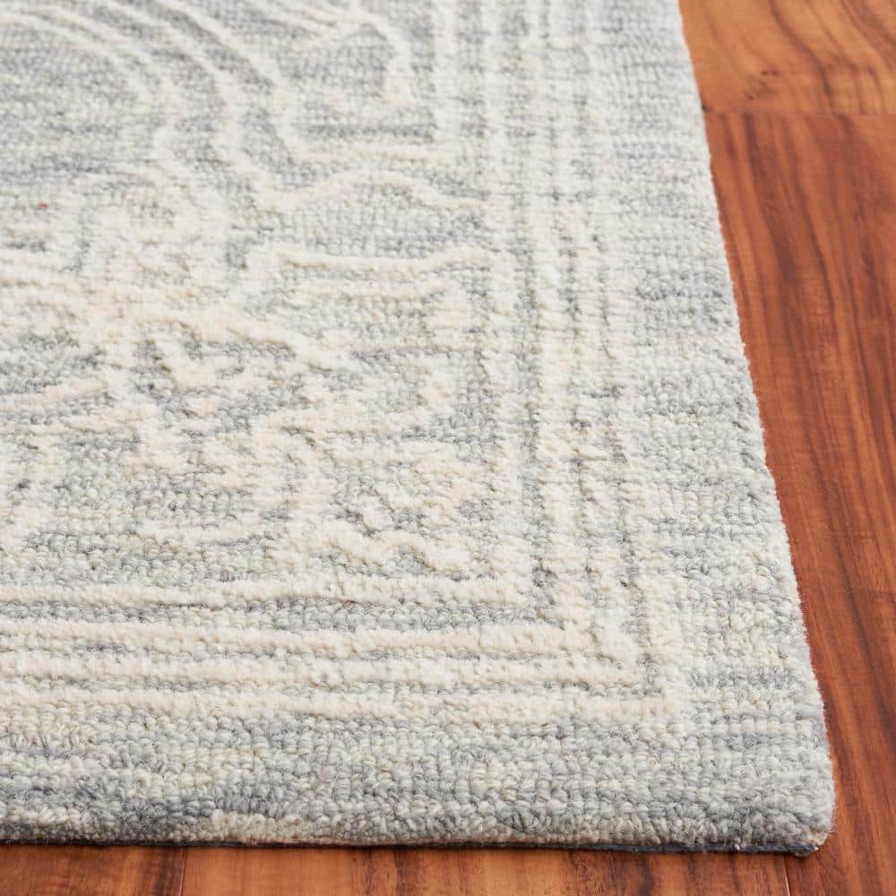 Ivory and Grey Hand Tufted Wool 4' x 6' Area Rug