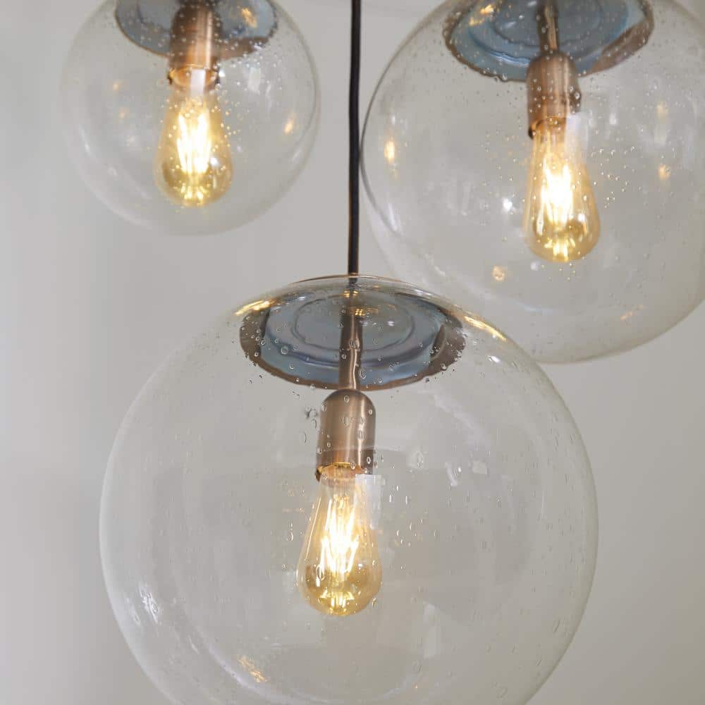 Leo Modern Globe Pendant Light in Satin Brass with Seeded Glass