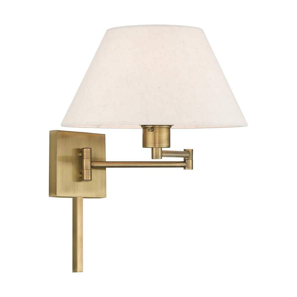 Antique Brass Swing Arm Wall Lamp with Oatmeal Fabric Shade