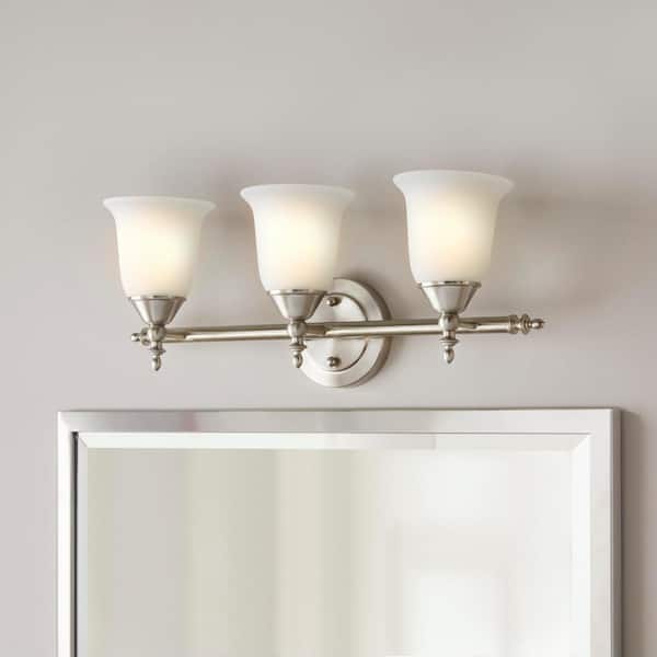 Hampton Bay Olgelthorpe 22 in. 3-Light Brushed Nickel Bathroom Vanity Light Fixture with Bell Shaped Frosted Glass Shades