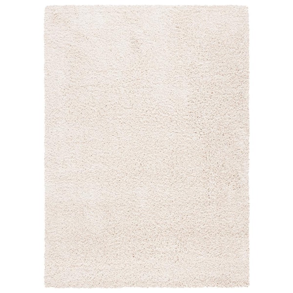 SAFAVIEH Evolution Shag Ivory 9 ft. x 12 ft. Solid Area Rug EVO520A-9 ...