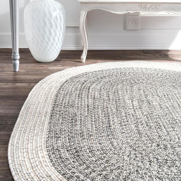 https://images.thdstatic.com/productImages/c62fd857-ab68-4cf5-9ff1-2aa3f8c42de5/svn/gray-nuloom-outdoor-rugs-hjfv06a-o76096-1d_600.jpg