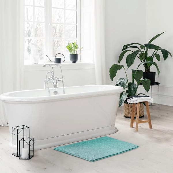 https://images.thdstatic.com/productImages/c64acbb1-f4f7-4cbd-bde4-2fe81ecf6cf5/svn/aqua-resort-collection-bathroom-rugs-bath-mats-ymb001931-fa_600.jpg