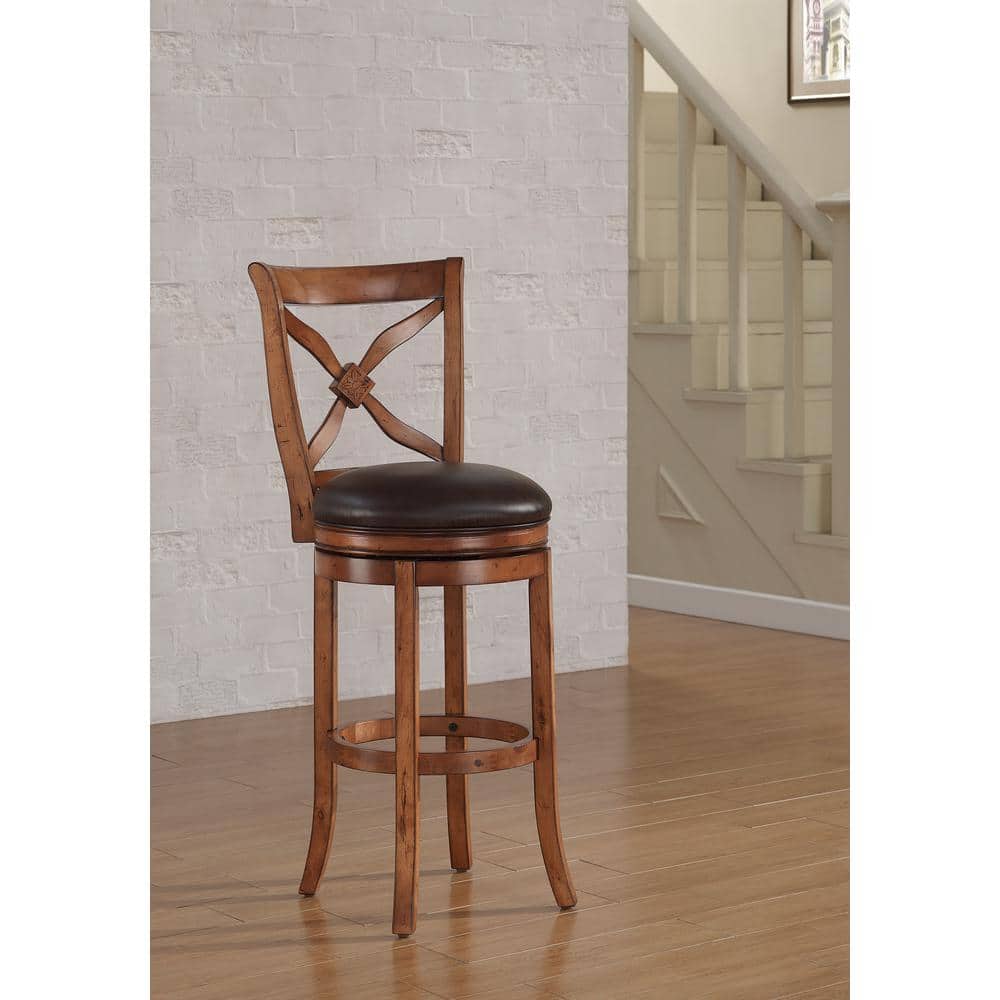 Transitional Brown Leather Swivel Chair with Carved Flower Detail