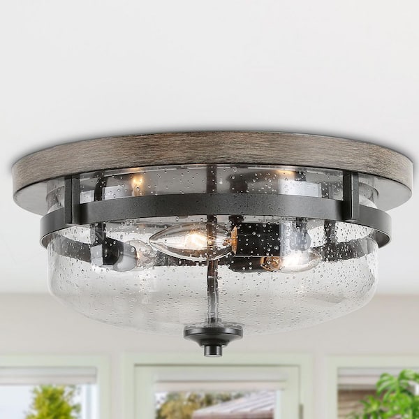 13.5 in. 3-Light Bronze Flush Mount Ceiling Light with Drum Clear Seeded Glass Shade and Round Faux Aged Wood Plate