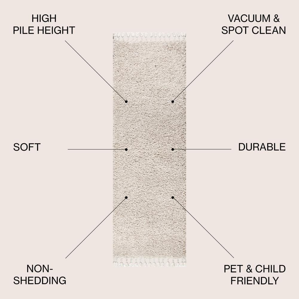 Cream 2 x 8 Shag Reversible Synthetic Area Rug with Tassels