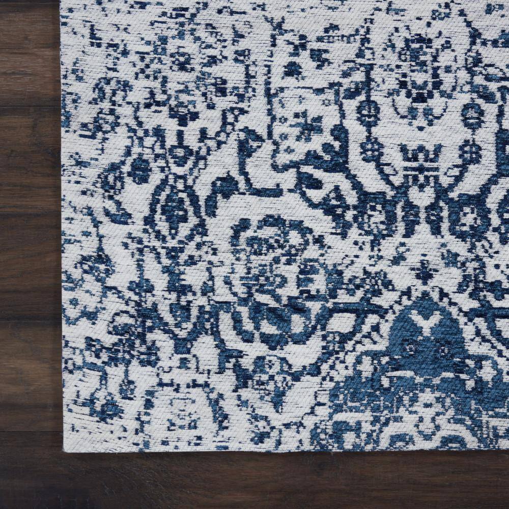 Ivory and Navy Medallion Synthetic 4' x 6' Area Rug
