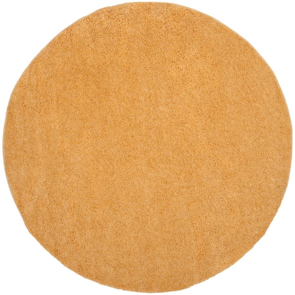 SAFAVIEH Arizona Shag Gold 7 ft. x 7 ft. Round Solid Area Rug